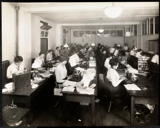 Women typing in an office of the Mantle Co. of America, New York, 1915 or 1916